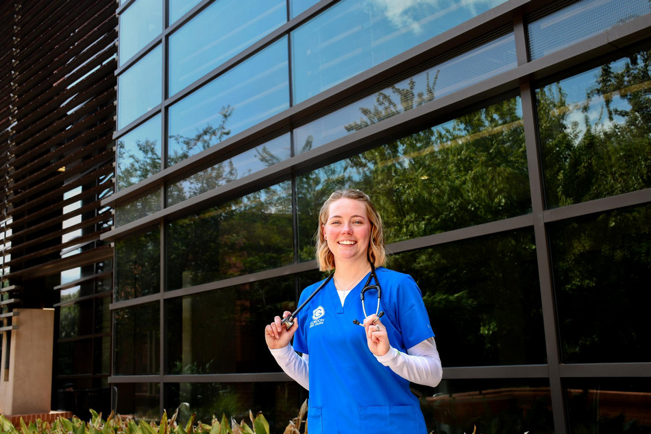 Gordon State College nursing student Alyssa Smith stands outside the Nursing and Allied Health Sciences Building.