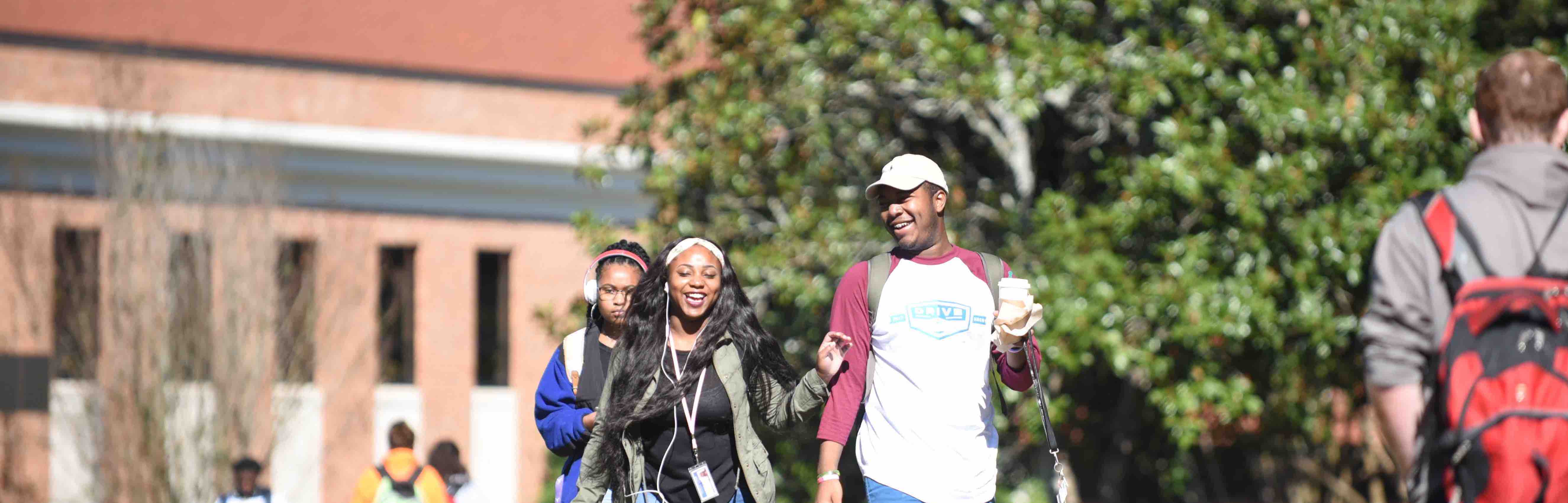 laughing-students-walking-campus-d.jpg