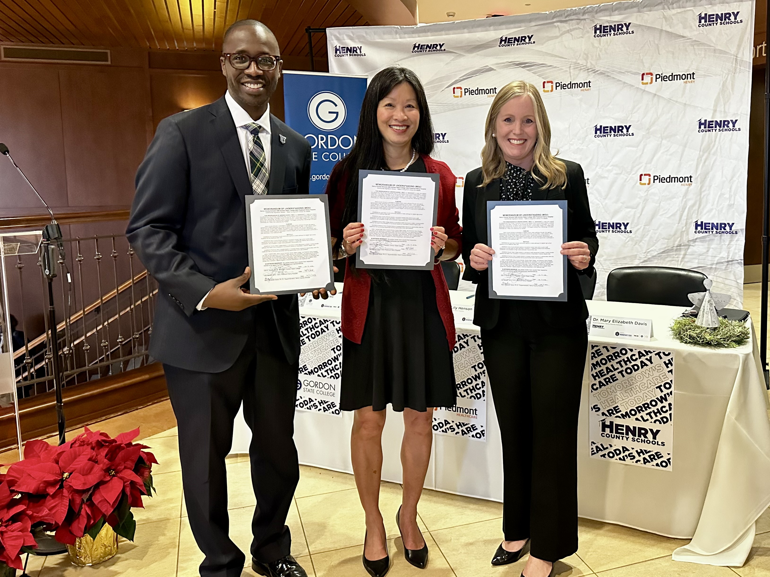 (L-R) Dr. Kirk A. Nooks, GSC president; Lily Henson, M.D., CEO of Piedmont Henry; Dr. Mary Elizabeth Davis, Henry County Schools Superintendent